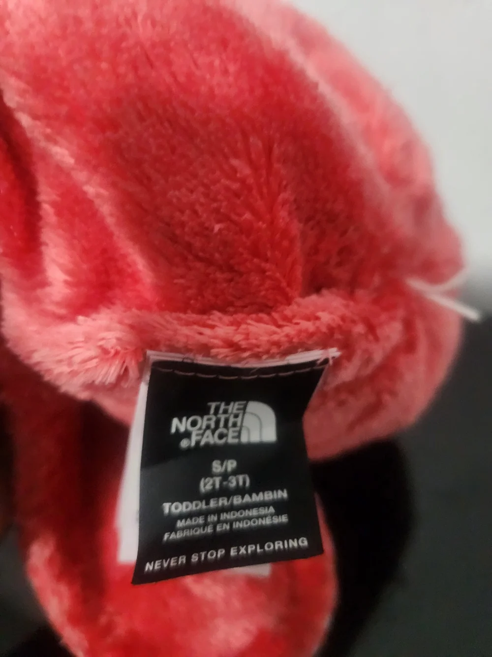 The North Face Kids Earflap Pom Beanie in Light Gray and Pink